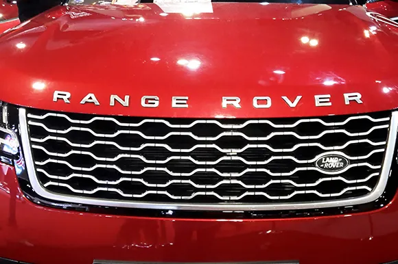 The front of a red Range Rover that is on display during Kuala Lumpur International Motor Show.