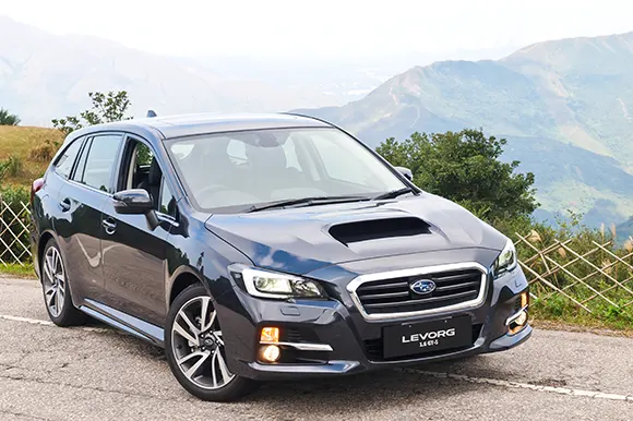 A black 2016 Subaru Levorg on the side of the road