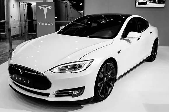 A white Tesla Model S P85D on display.